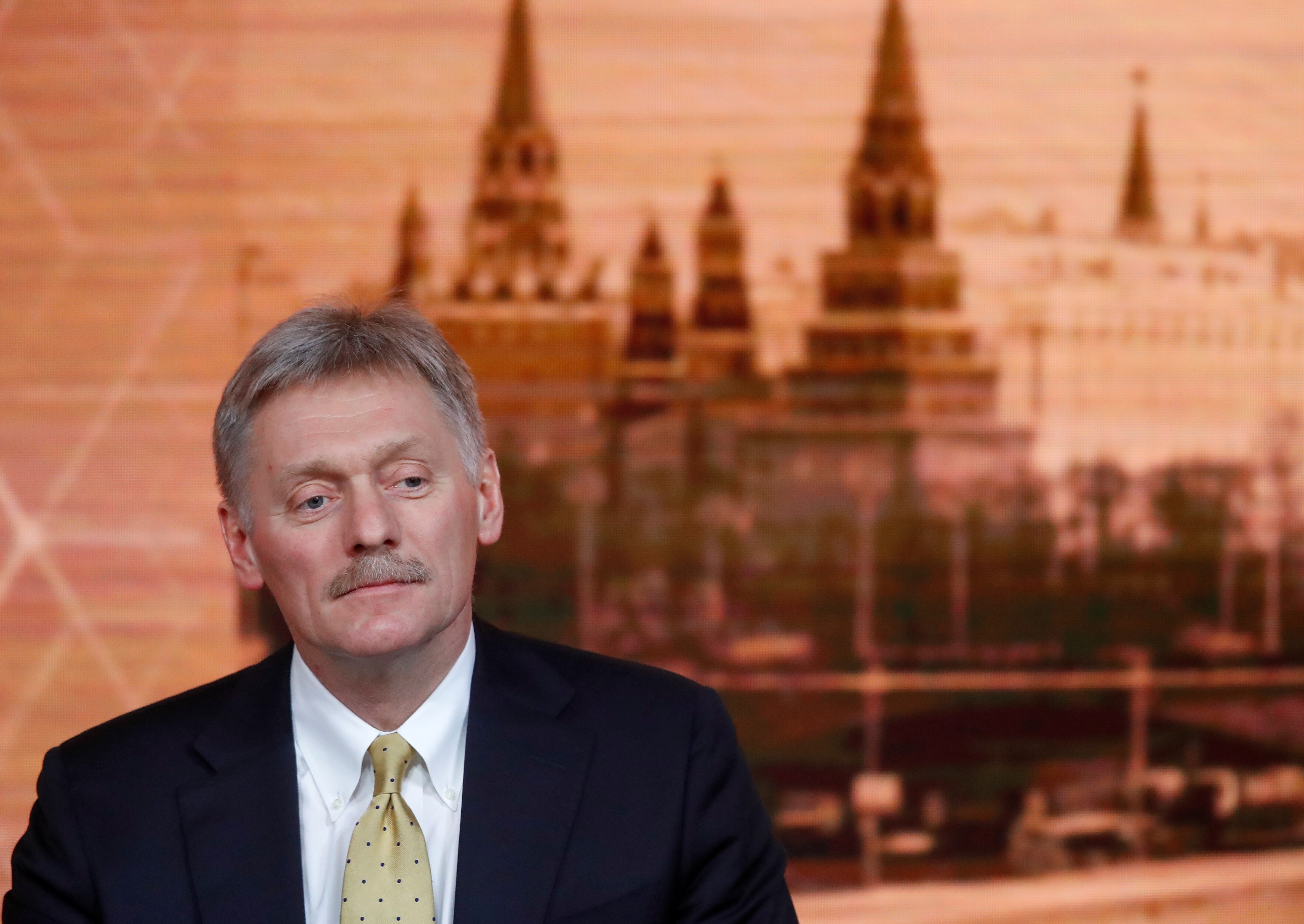 Kremlin spokesman Dmitry Peskov listens during Russian President Vladimir Putin's annual end-of-year news conference in Moscow on Dec. 19, 2019. (Evgenia Novozhenina/Reuters)
