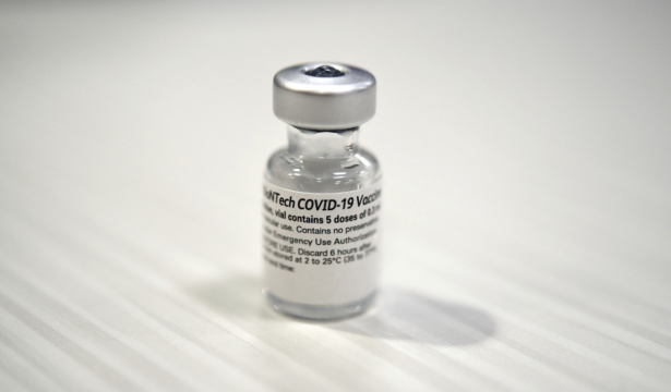 One of the first vials of the Pfizer BioNTech COVID-19 vaccine at Wake Forest Baptist Medical Center, in Winston-Salem, N.C., on Dec. 15, 2020. (Walt Unks/Winston-Salem Journal via AP)