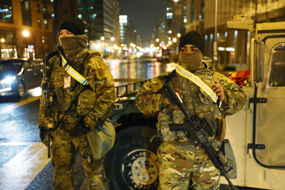 Members of the Pennsylvania National Guard stand guard in Washington on Jan. 15, 2021. (Joe Raedle/Getty Images)