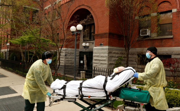 Emergency Medical Technicians (EMTs) wheel a man out of the Cobble Hill Health Center nursing home during an ongoing outbreak of the CCP virus in the Brooklyn borough of New York, on April 17, 2020. (Lucas Jackson/Reuters)