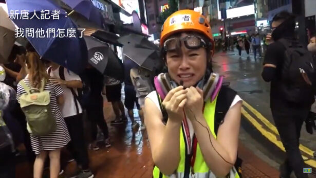 <br/>Epoch Times reporter Rachel Wong sobs before the camera after witnessing a protester shot by police in Causeway Bay, Hong Kong, on Aug. 31, 2019. (Screenshot from YouTube)