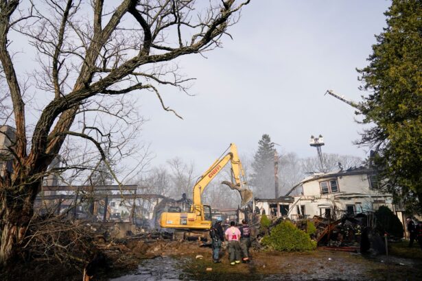 Firefighters work at the scene 