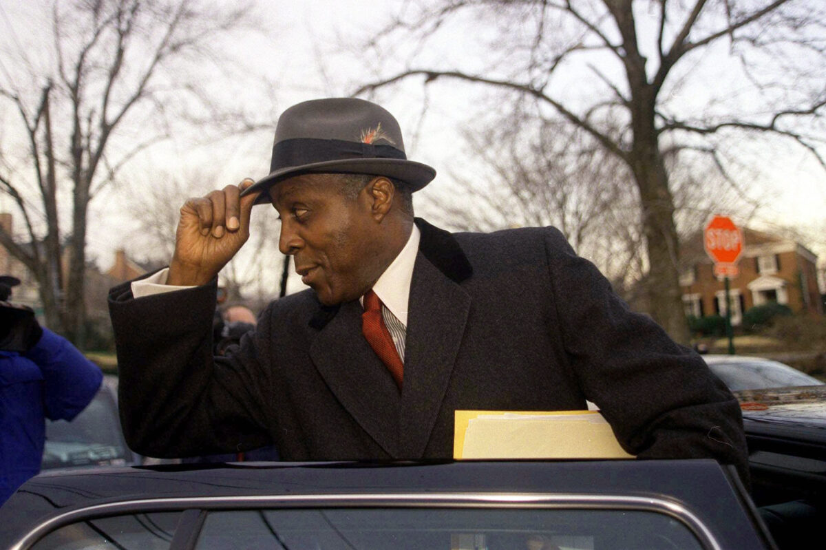 Vernon Jordan leaves his home