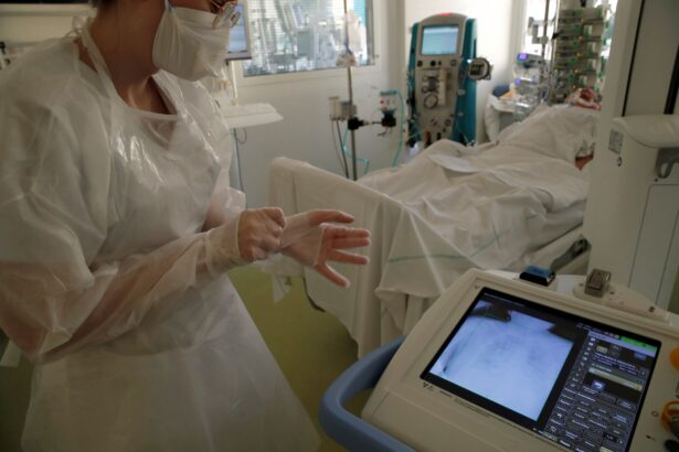 medical worker checks on a screen