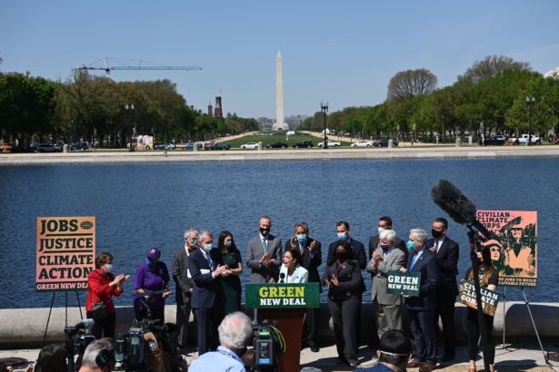 Rep. Alexandria Ocasio-Cortez (D-N.Y.) next to Sen. Ed Markey (D-Mass.), speaks during a press conference in Washington, on April 20, 2021. (Mandel Ngan/Getty Images)