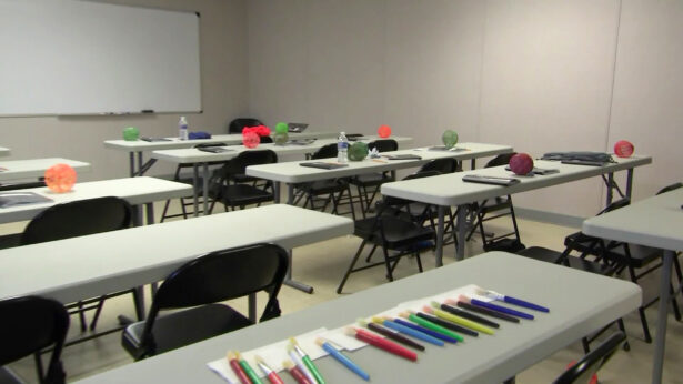 Tables and materials are seen at a HHS holding facility for unaccompanied minors in Carrizo Springs, Texas, on March 24, 2021. (Pool)