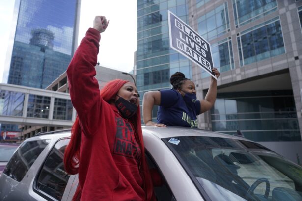 People cheer after a guilty verdict was announced at the trial of former Minneapolis police officer Derek Chauvin for the 2020 death of George Floyd, in Minneapolis, Minn., on April 20, 2021. (Morry Gash/AP Photo)
