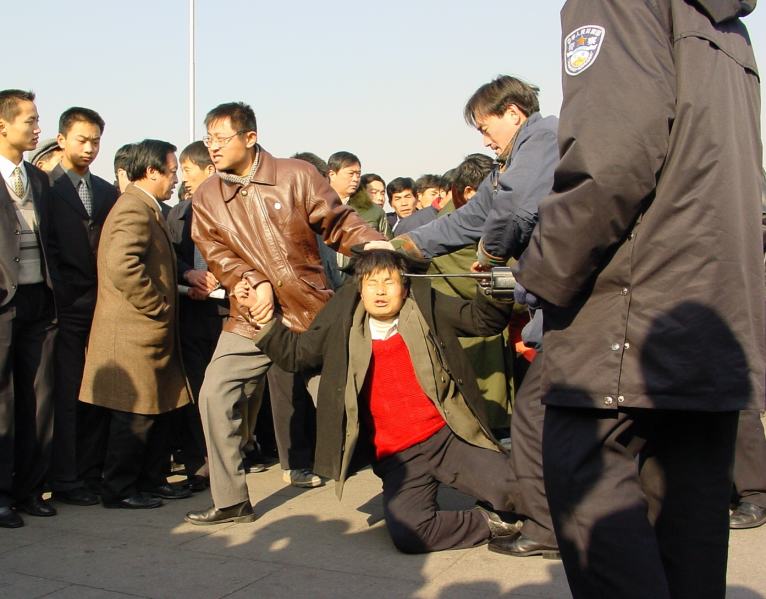 arrest a Falun Gong practitioner