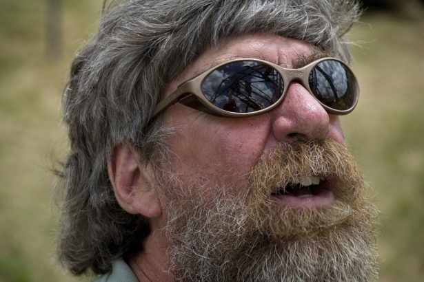Post Mills Airport owner Brian Boland looks skyward at the airport in Post Mills, Vt., on June 4, 2010. (Geoff Hansen/The Valley News via AP)