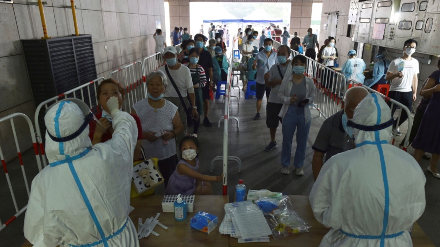 China's Zero-COVID Strategy Asks a High Price