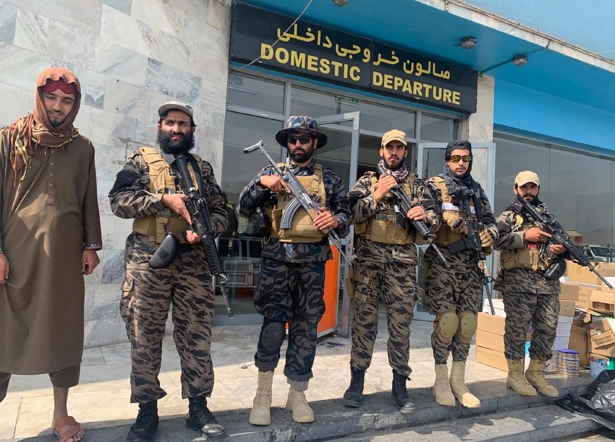 Taliban extremists stand guard inside the Hamid Karzai International Airport after the U.S. withdrawal in Kabul, Afghanistan on Aug. 31, 2021. (Kathy Gannon/AP Photo)