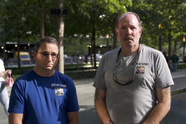 First responders during 9/11 David Goldberg (L) and Miles Warren (R) at World Trade Center memorial site in Manhattan, New York, on Sep. 10, 2021 (Enrico Trigoso/The Epoch Times)