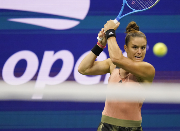 Maria Sakkari of Greece returns a shot to Emma Raducanu of Great Britain during the semifinals of the U.S. Open tennis championships in New York on Sept. 9, 2021. (Frank Franklin II/AP Photo)