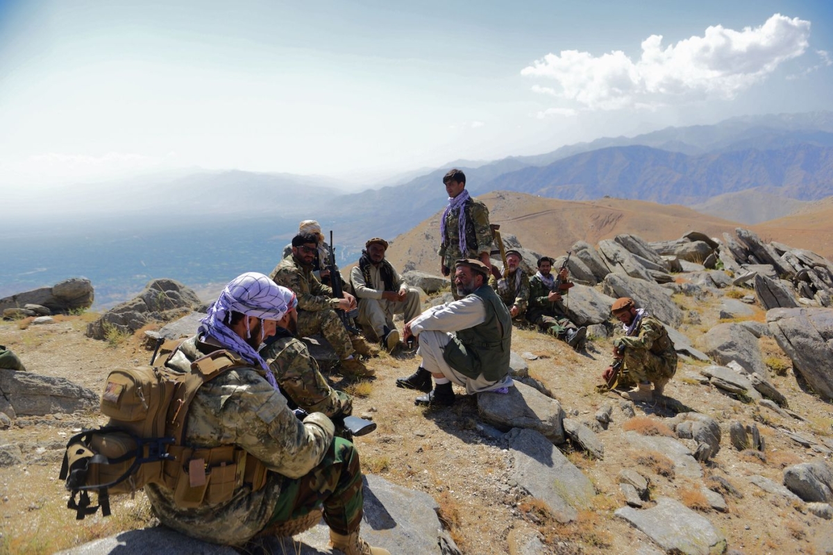 Afghan resistance movement and anti-Taliban forces take rest as they patrol on a hilltop in Darband area in Anaba district, Panjshir province on Sept. 1, 2021. Panjshir remains the last major holdout of anti-Taliban forces led by Ahmad Massoud, son of the famed Mujahideen leader Ahmed Shah Massoud. (Ahmad Sahel Arman/AFP via Getty Images)