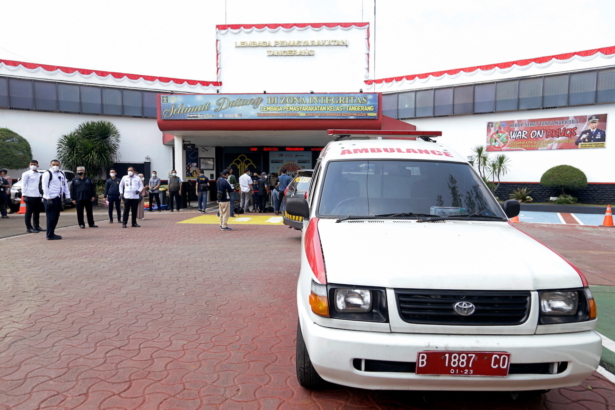 An ambulance is seen at the main entrance gate of Tangerang prison following a fire overnight at an overcrowded jail in Tangerang on the outskirts of Jakarta, Indonesia, on Sept. 8, 2021. (Ajeng Dinar Ulfiana/Reuters)