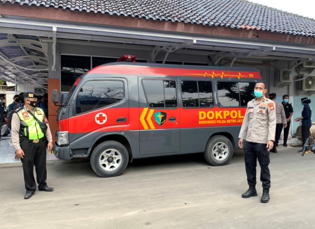 A police vehicle is seen outside Tangerang Hospital, where the remains of people killed in a fire at Tangerang Prison are kept, in Banten province, Indonesia, on Sept. 8, 2021. (Yuddy Cahya/Reuters)