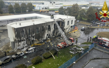 Plane Crashes Into Building Near Milan; All 8 Aboard Die