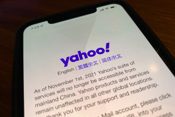 A smart phone shows the home page of Yahoo when accessed inside China in Beijing, China on Nov. 2, 2021. (Ng Han Guan/AP Photo)