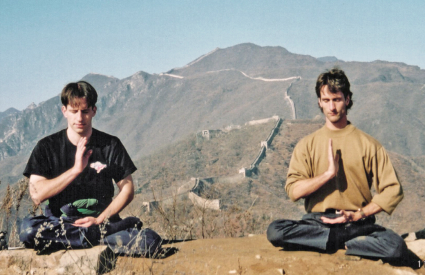 Zenon Dolnyckj and Joel Chipkar meditate on the Great Wall the day before their appeal in Tiananmen. (Courtesy of Zenon Dolnyckj)