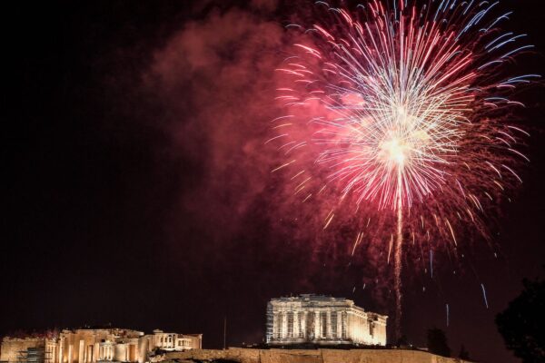 Fireworks explode over the ancient Acropolis in Athens during the New Year's Eve celebrations on Dec. 31, 2021. (Louisa Gouliamaki/AFP via Getty Images)