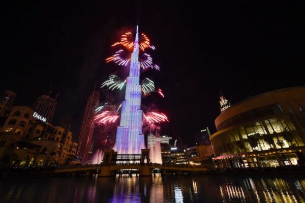 Fireworks erupted from the Burj Khalifa in the Gulf emirate of Dubai, on Dec. 31, 2021. (Stringer/AFP via Getty Images)