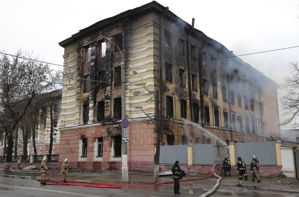 Firefighters hose down the burning building of the Central Research Institute of the Aerospace Defense Forces in the Russian city of Tver, Russia, on April 21, 2022. (Vitaliy Smolnikov/Kommersant Publishing House via AP)