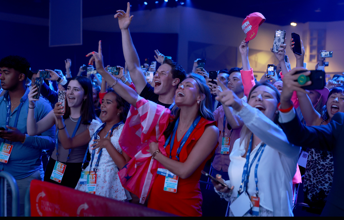 People cheer as former President Donald Trump arrives on stage during the Turning Point USA Student Action Summit held at the Tampa Convention Center in Tampa, Fla., on July 23, 2022. (Joe Raedle/Getty Images)