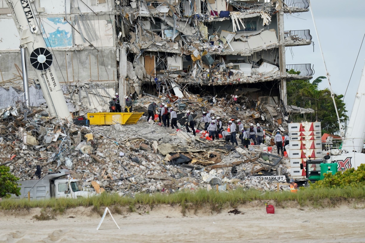 Crews work in the rubble Champlain Towers South condo in Surfside, Fla., on June 29, 2021. (Lynne Sladky/AP Photo)
