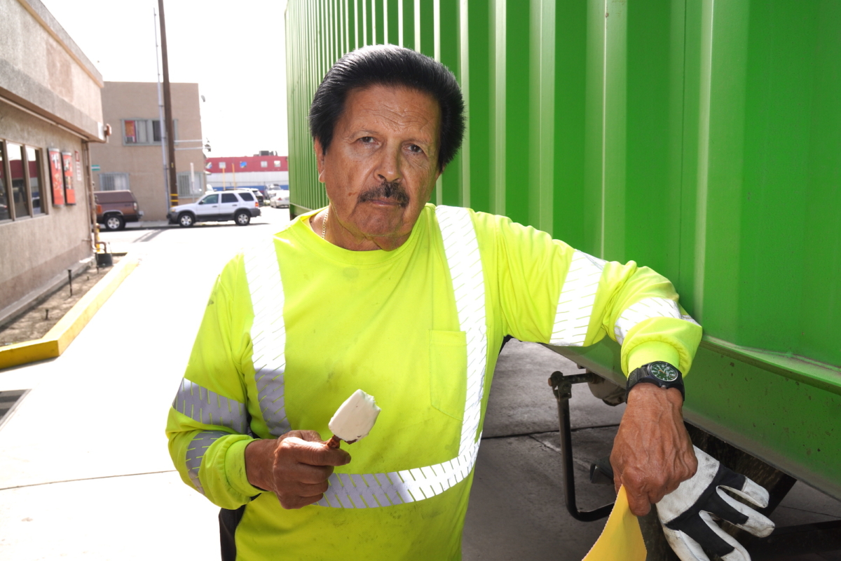 Company truck driver Alex Velasco said he thinks California's new state labor law affecting truck owner-operators could hurt the industry. (Allan Stein/The Epoch Times)