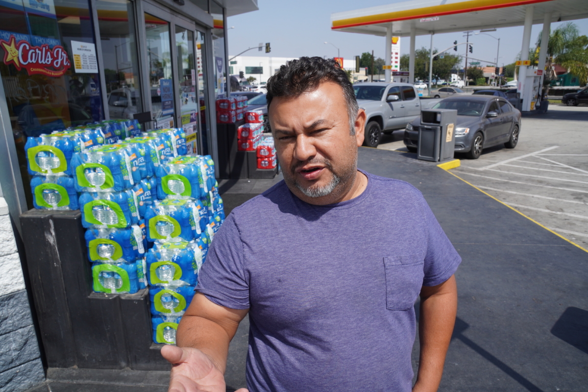 Francisco Gonzalez fears losing his status as an independent truck owner-operator as he stands outside a truck stop in Long Beach, Calif., on July 26, 2022. (Allan Stein/The Epoch Times)