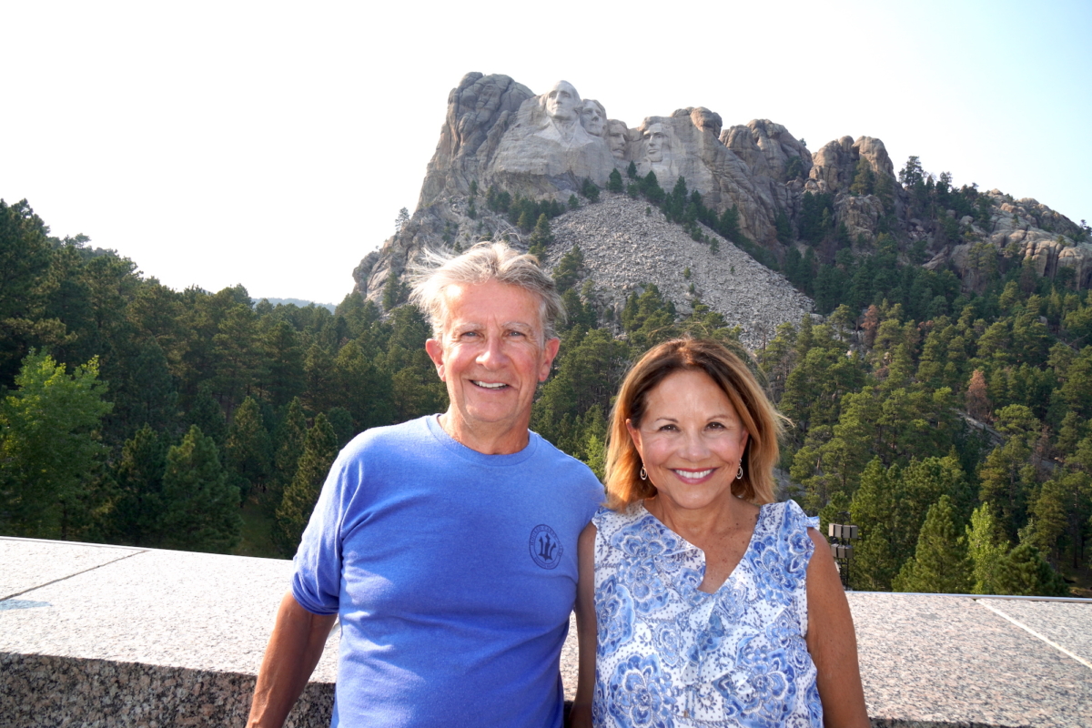 Kate and Jim Denker of New Jersey make their first visit to Mount Rushmore in Keystone, S.D., on Sept. 7, 2022, after years of waiting. (Allan Stein/The Epoch Times)