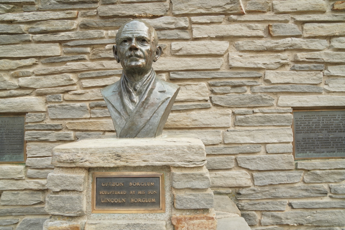 A bust of Mount Rushmore sculptor Gutzon Borglum stands near his former studio at Mount Rushmore National Park in Keystone, S.D., on Sept. 7, 2022. (Allan Stein/The Epoch Times)