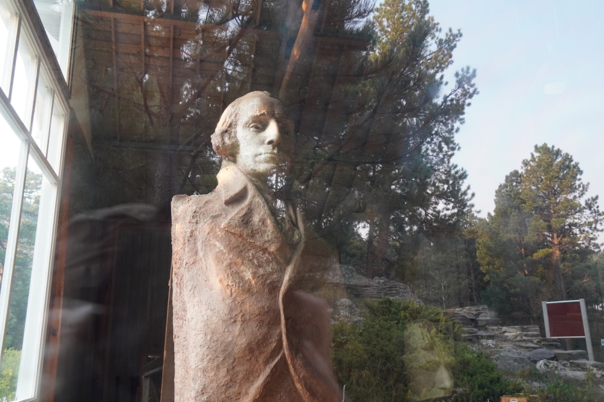 A bust of George Washington, which sculptor Gutzon Borglum used to create the Mount Rushmore sculpture, remains intact in the artist’s studio in Keystone, S.D., on Sept. 7, 2022. (Allan Stein/The Epoch Times)