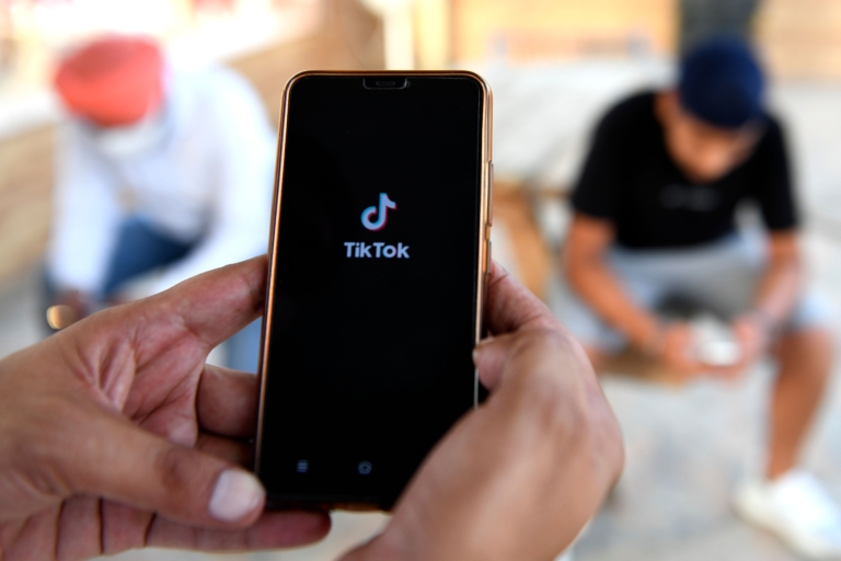 Users browse through the Chinese-owned video-sharing TikTok app on smartphones in Amritsar, India, on June 30, 2020. (Narinder Nanu/AFP via Getty Images)